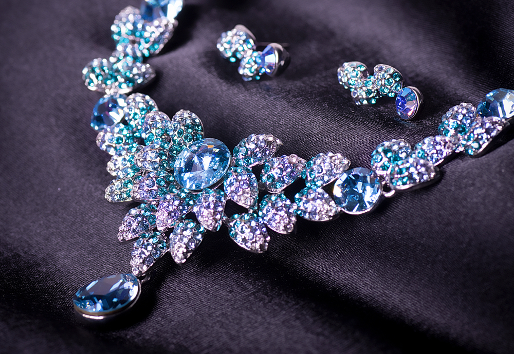 Estate jewelry displayed on a dark background