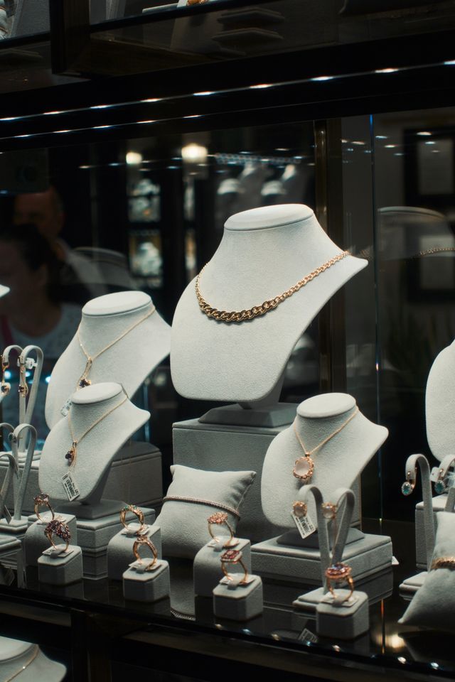 Display case featuring luxury watches and jewelry