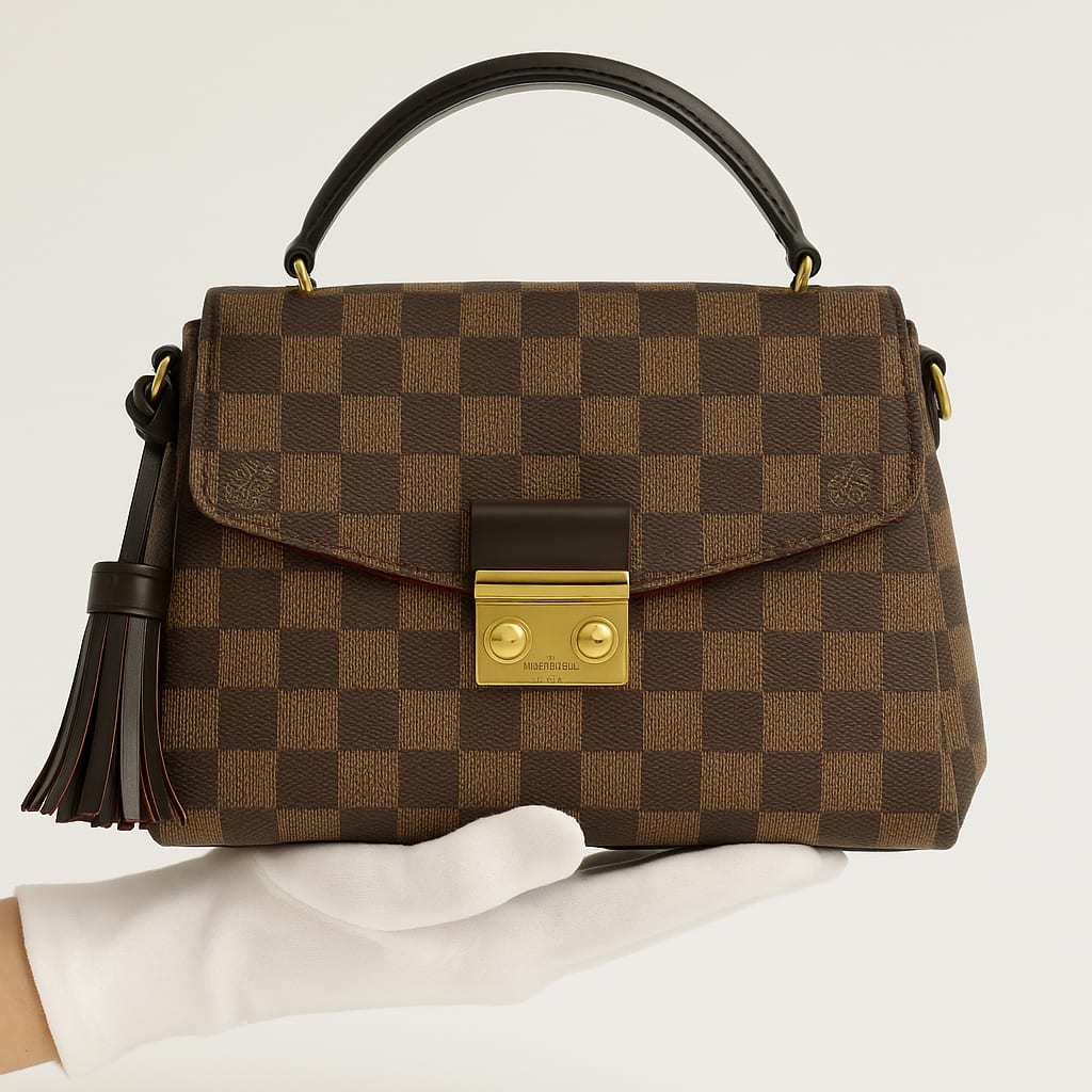 Detail of Louis Vuitton Damier Ebene Croisette Bag hardware