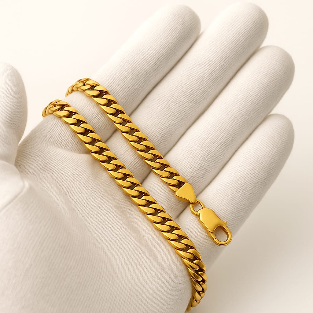 Close-up of the Cuban Link Chain held by a gloved hand