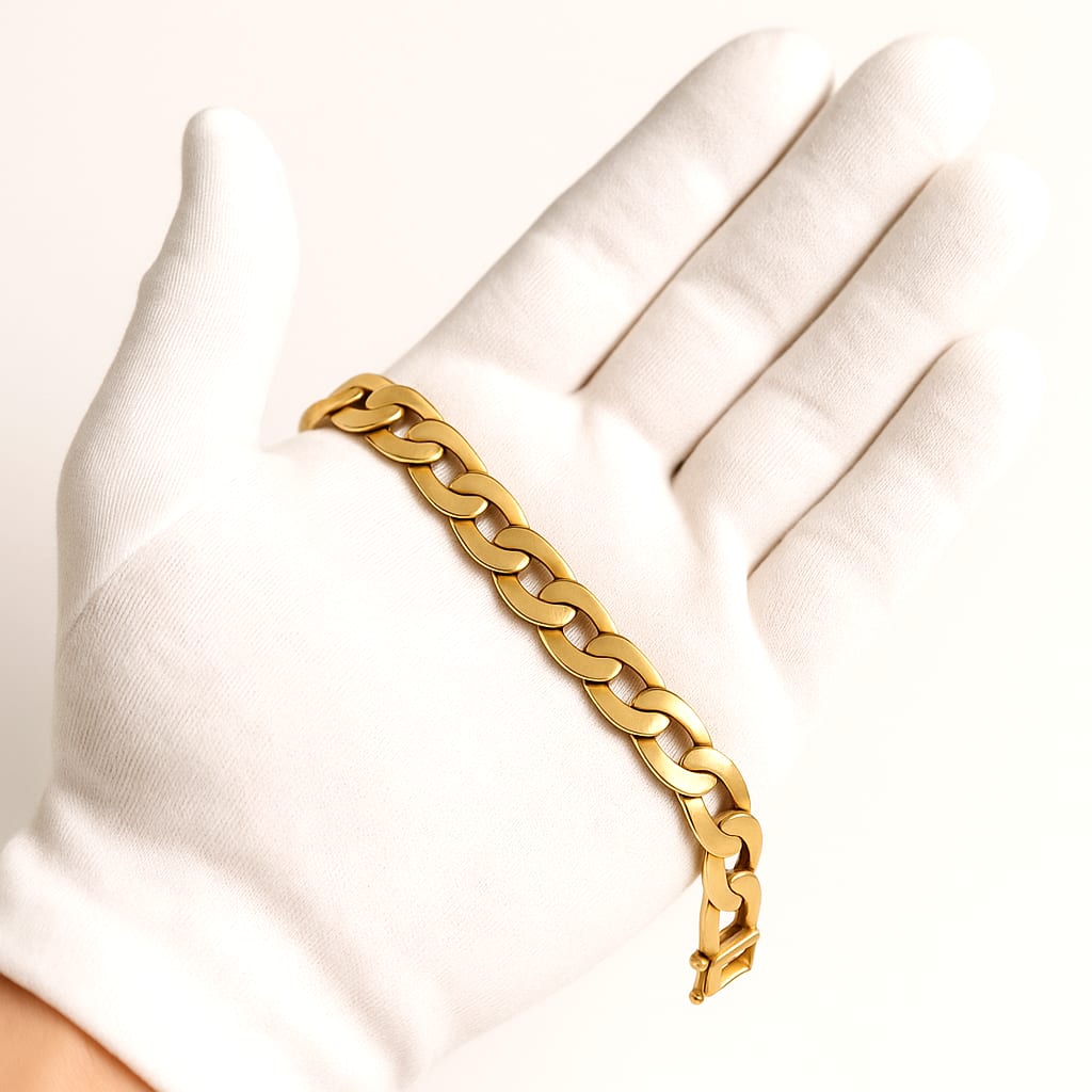Bracelet being held with white gloves