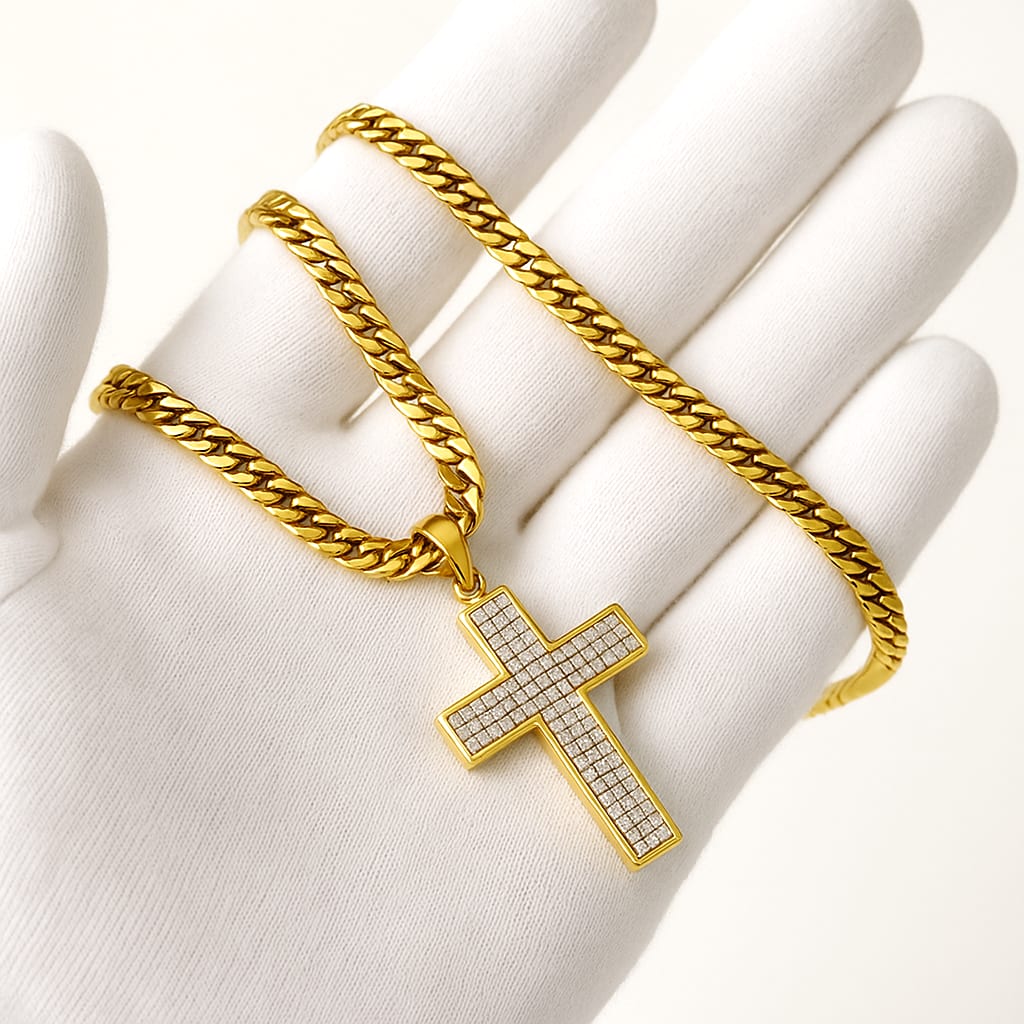 Gloved hand holding necklace