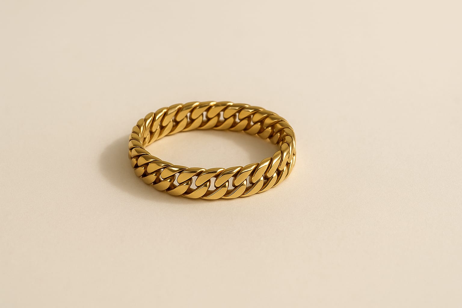18K Yellow Gold Cuban Link Ring displayed luxuriously