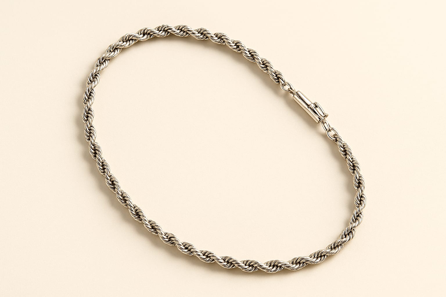 14K White Gold Rope Chain displayed on a luxury surface