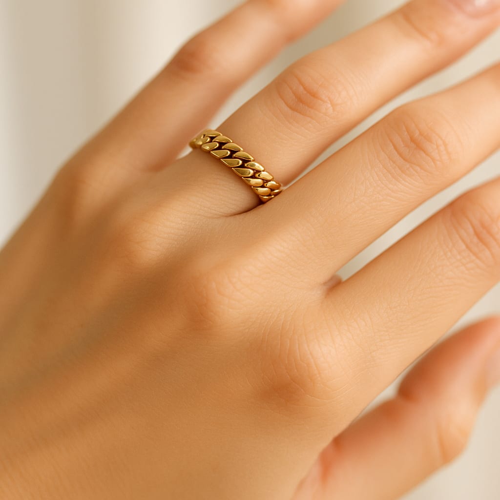 Model wearing 18K Yellow Gold Cuban Link Ring in a lifestyle setting
