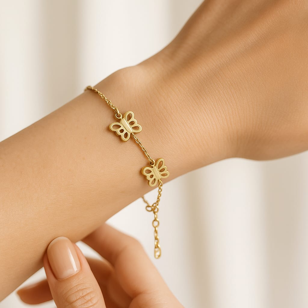 Model wearing the gold bracelet in a lifestyle setting.