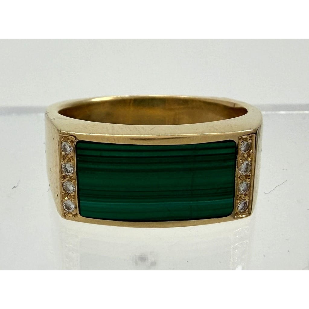 Close-up of the malachite and diamond settings