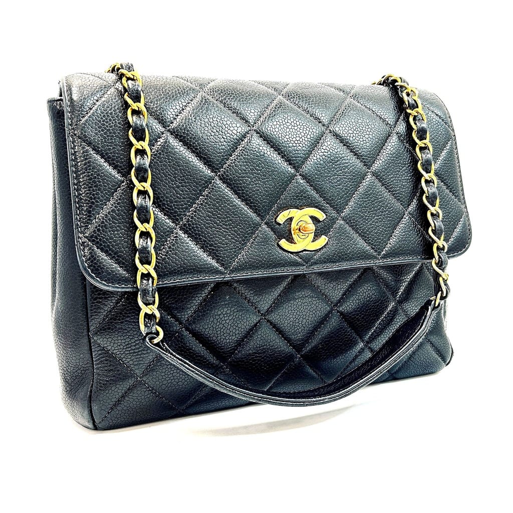 Interior view of Chanel CC Square Flap Bag showing zip pocket