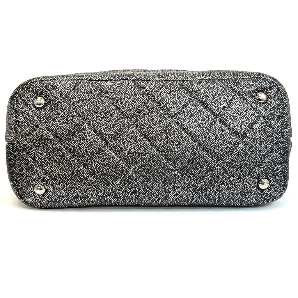 Exterior view showing wear on Chanel Tote