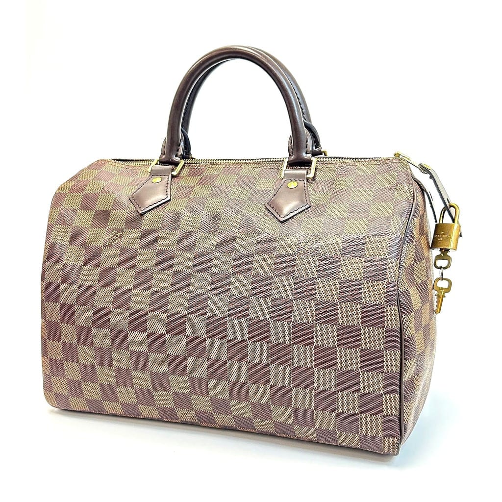 Interior view of Louis Vuitton Speedy 30 showing red lining