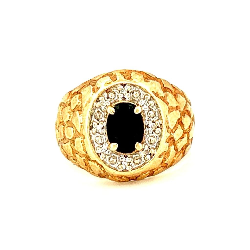 Close-up of 10K gold onyx and diamond ring