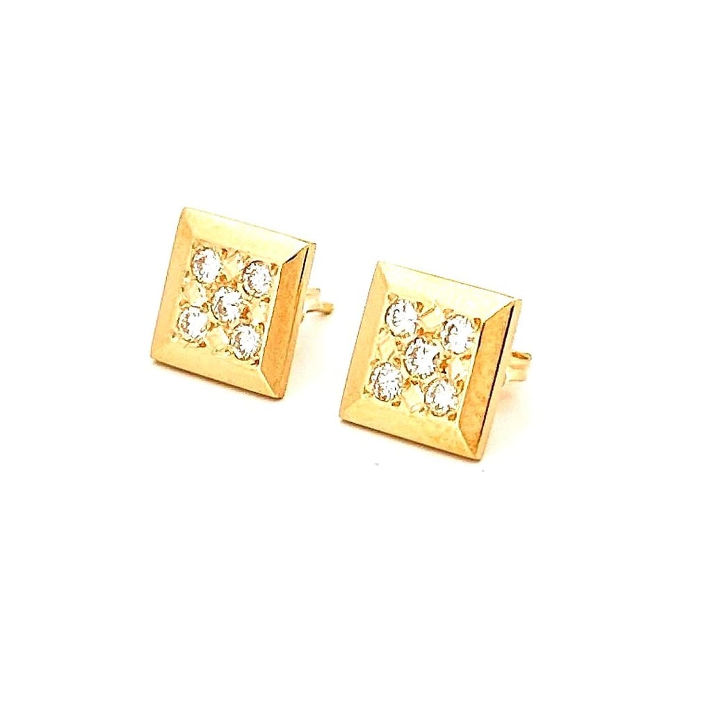 Close-up of diamond earrings with push back closure