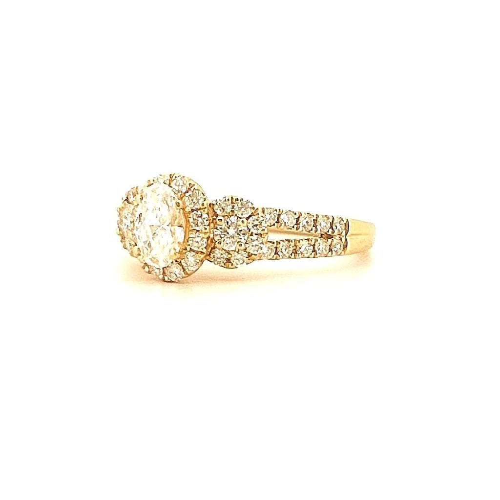 Close-up view of the pavé diamond setting on the 14K Yellow Gold Ring.
