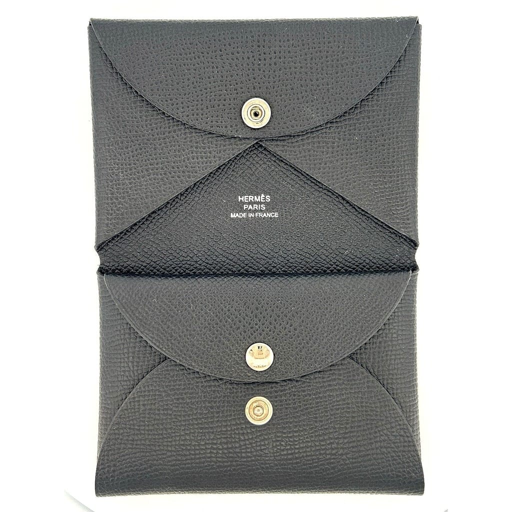 Close-up of Hermès Calvi Duo card holder silver-tone hardware