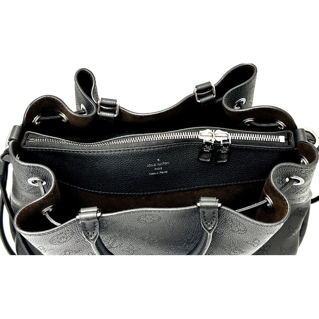 Silver-tone hardware detail on Louis Vuitton Tote