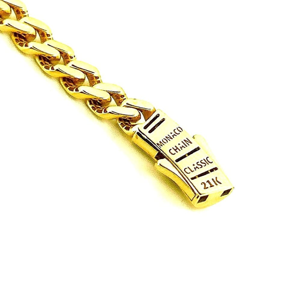 21K Yellow Gold Monaco Cuban Chain displayed on a surface