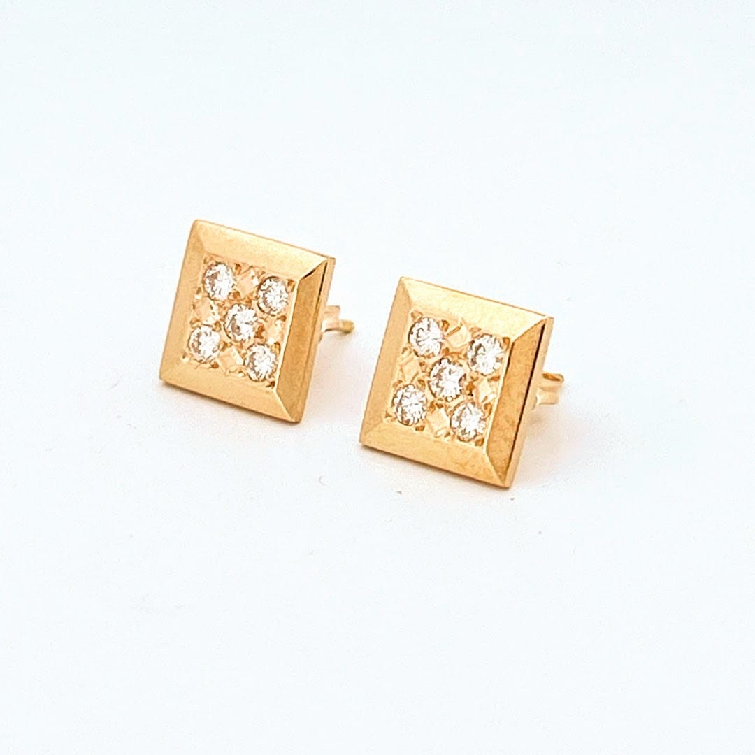 Side view of the earrings showing the push back closure.