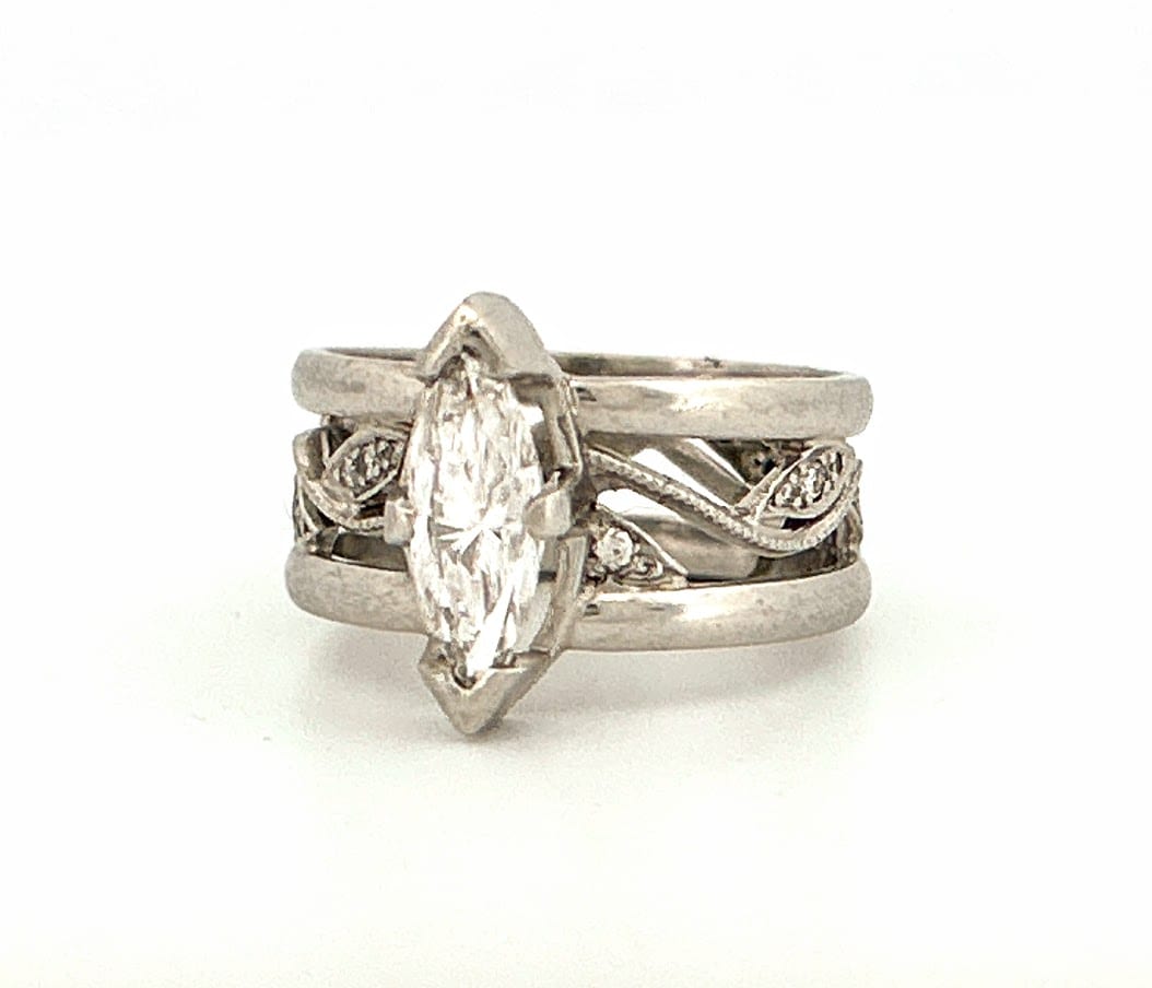 Round diamonds accentuating the platinum ring