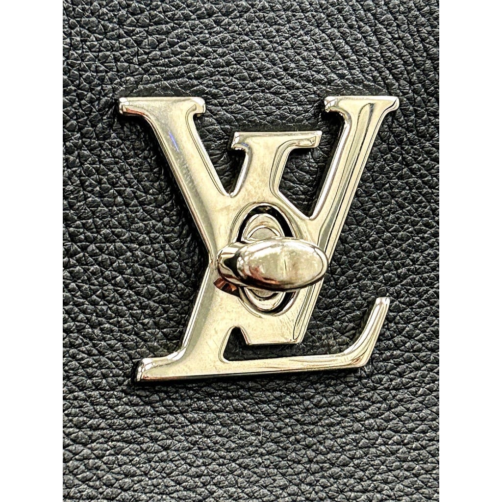 Close-up of the silver-tone hardware on the Louis Vuitton tote