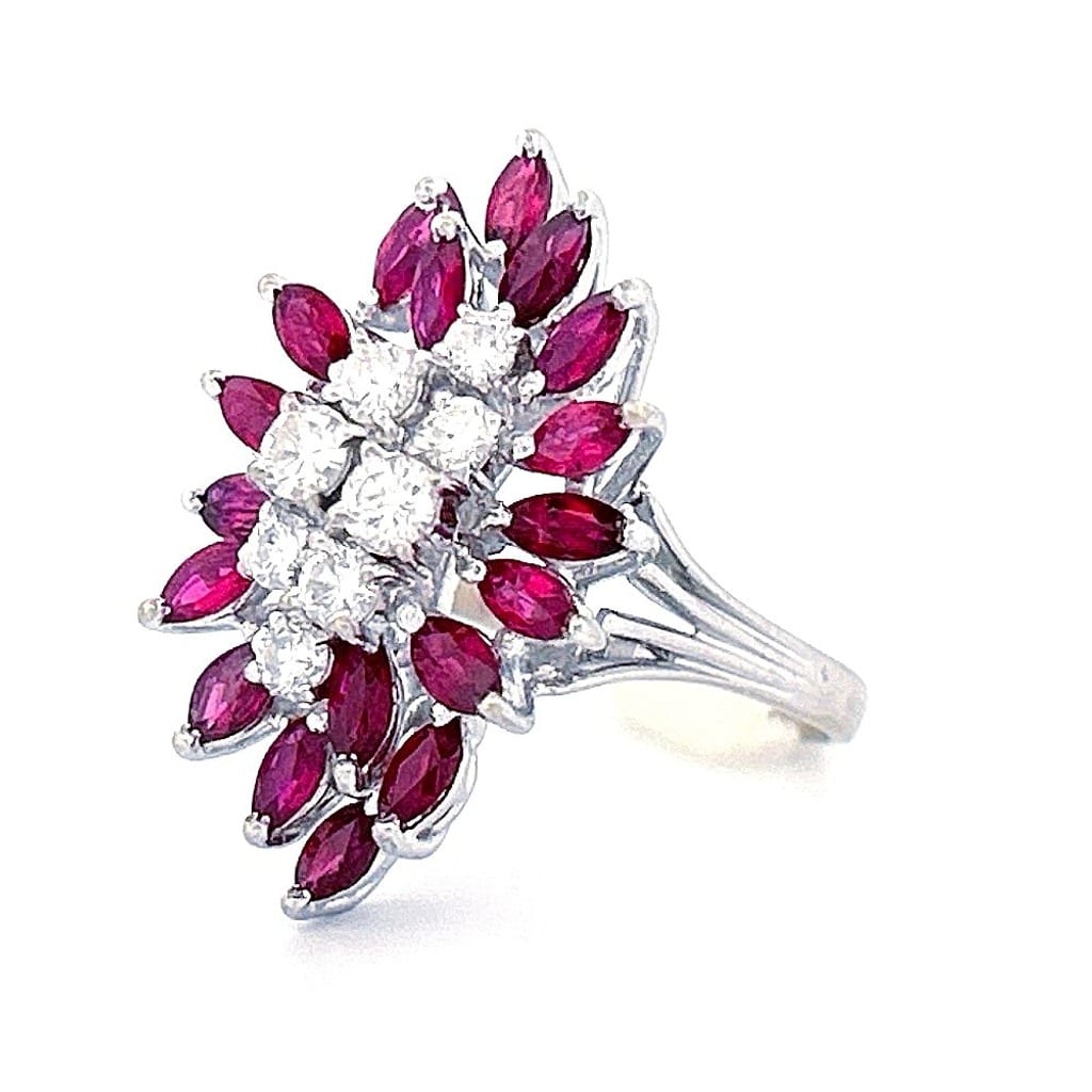 Full view of the vintage ring on a display stand.