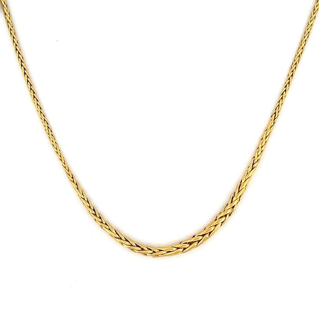 14K Yellow Gold Wheat Chain on display