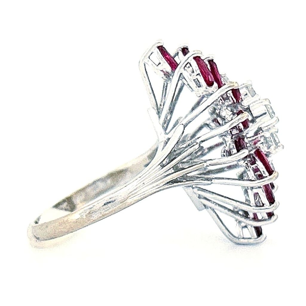 Detailed view of the ring's gemstone cluster from the top angle.