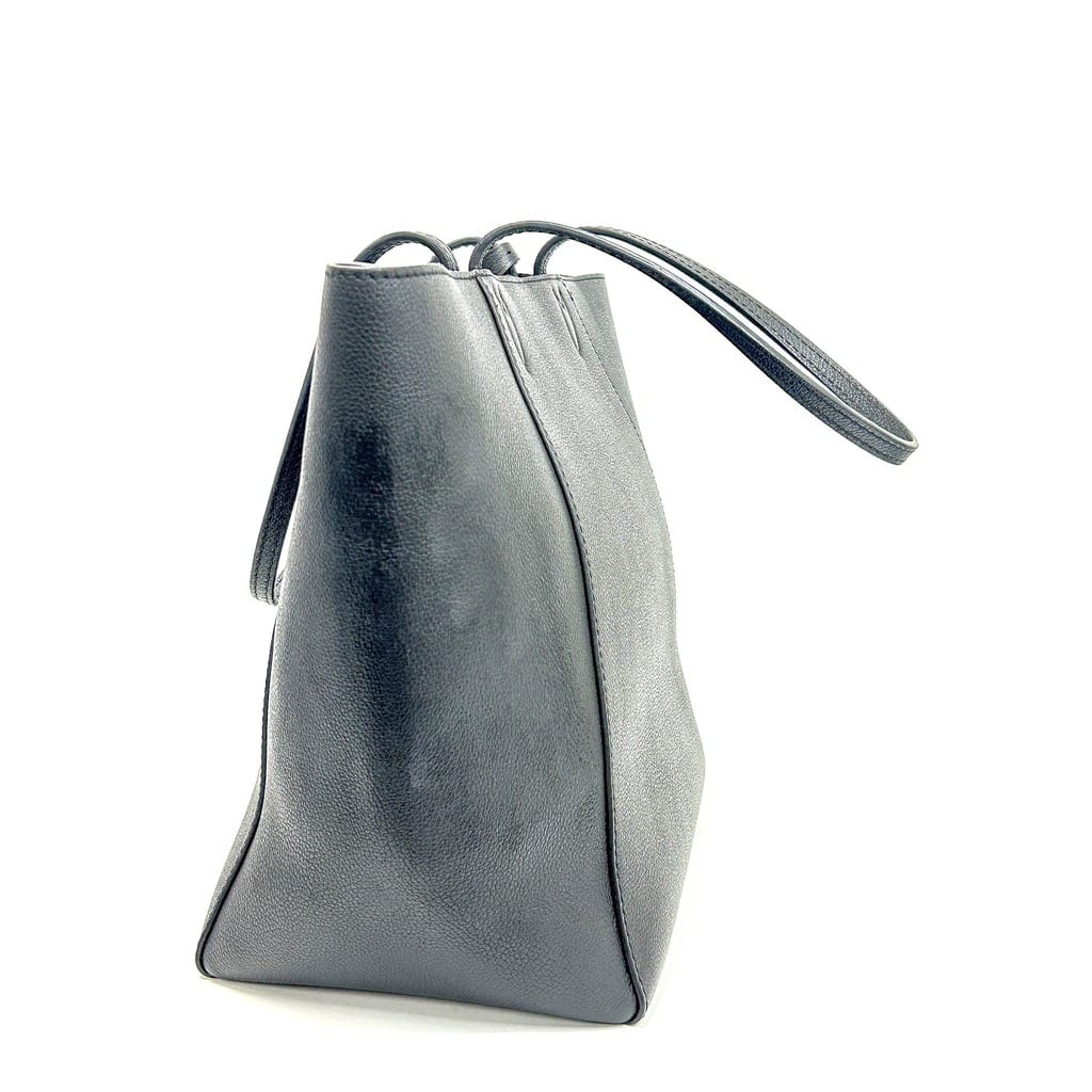 Louis Vuitton LockMe Cabas MM Black Tote on display